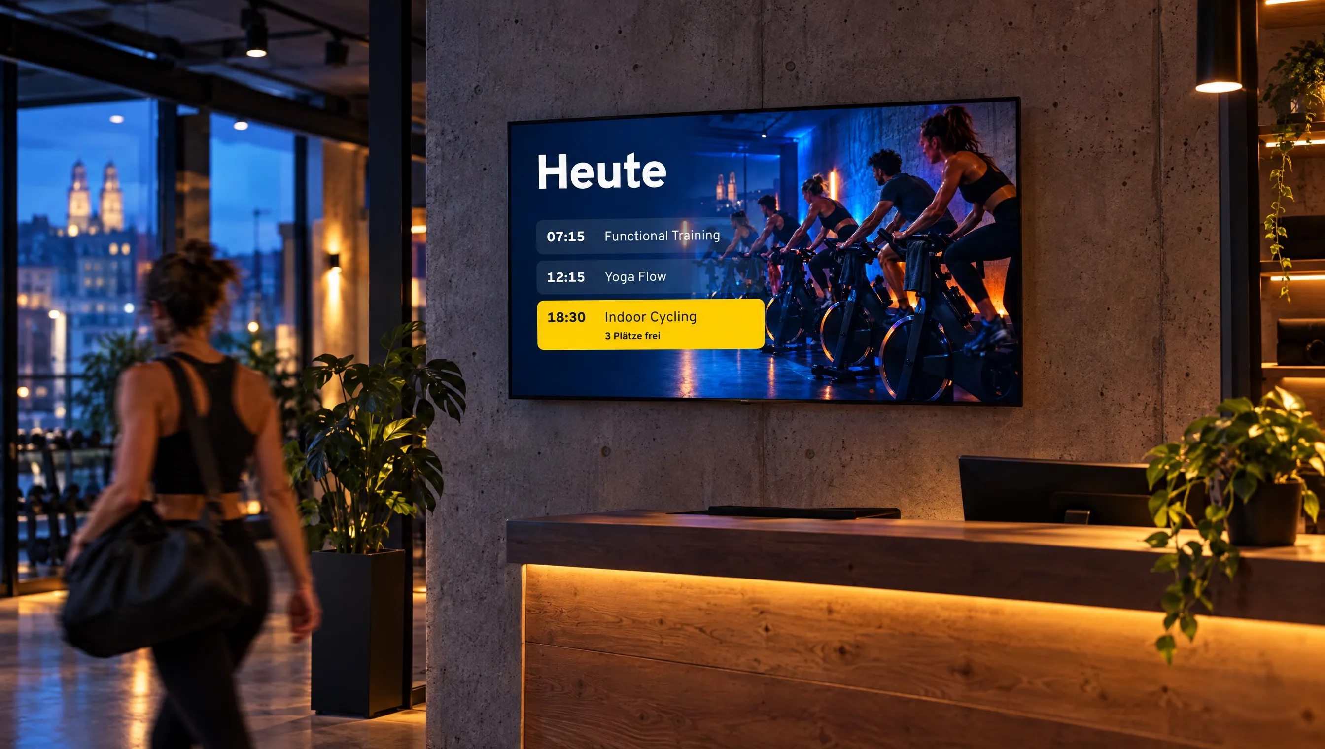 Empfang eines Fitnessstudios, auf dem Bildschirm der Kursplan des Tages